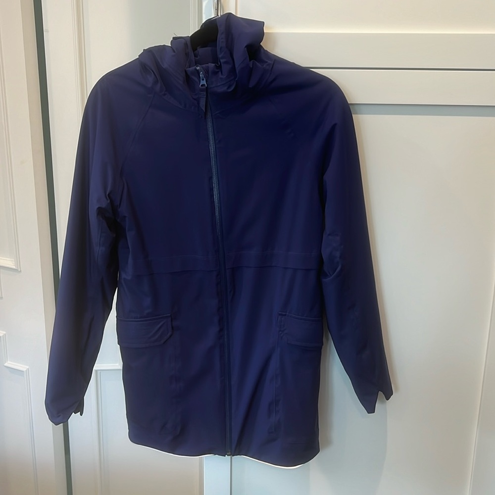 Girls blue Ivivva fleece-lined, hooded, longer length rain jacket